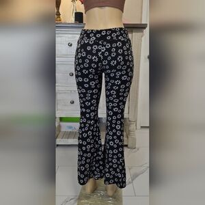 No Boundaries Black Daisy Print Flare Pants
